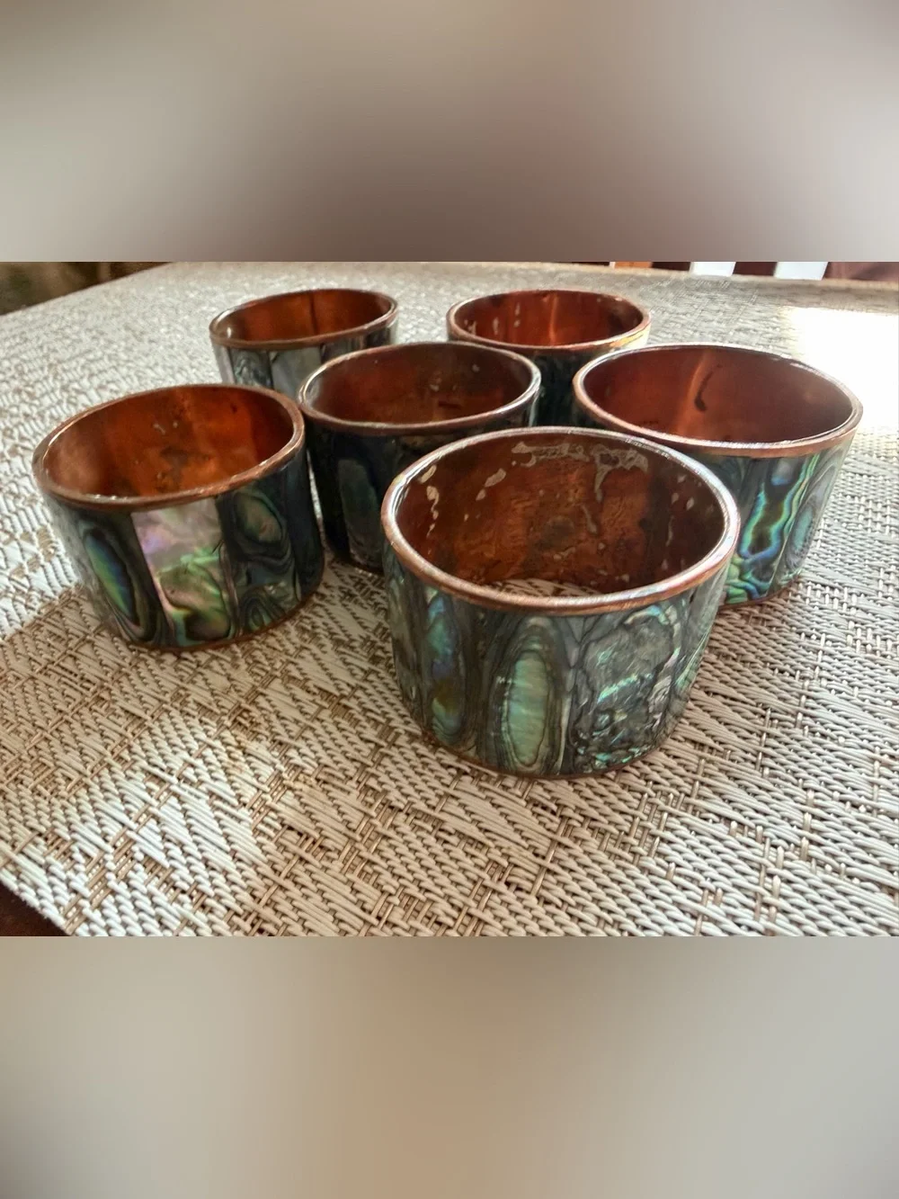 Copper and abalone shell napkin rings